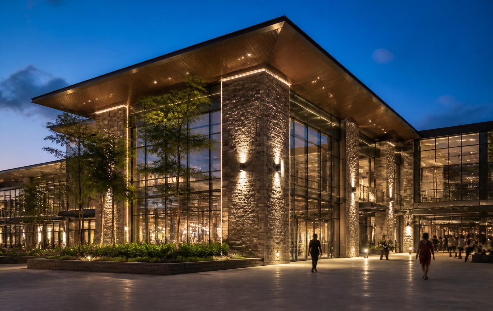 Modern YHONES Market Center commercial building exterior at dusk